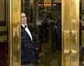 Behind brass doors.